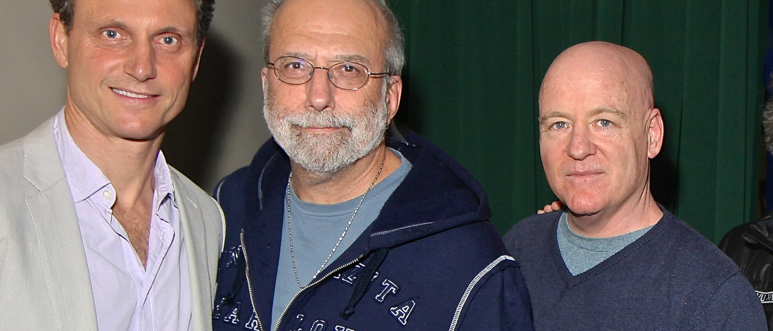 Writers Guild of America East president Tom Fontana, in glasses and a navy hoodie, standing between two fellow panelists at the Montclair Film Festival